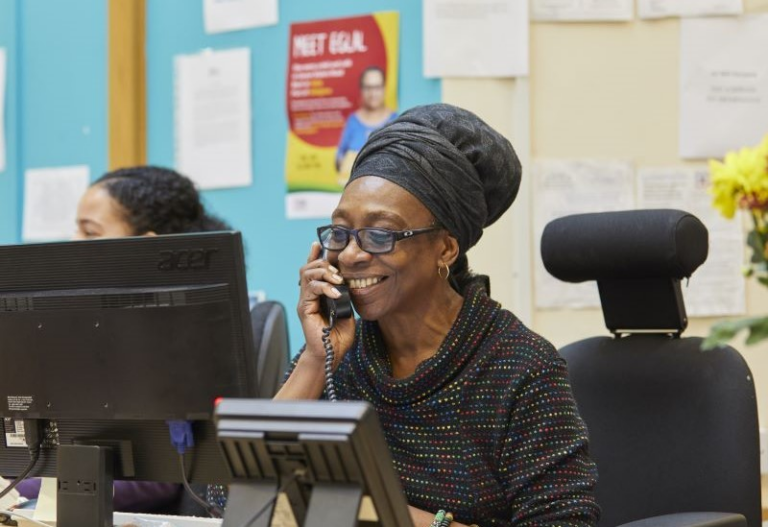 An Islington Law Centre employee speaking to a client on the phone